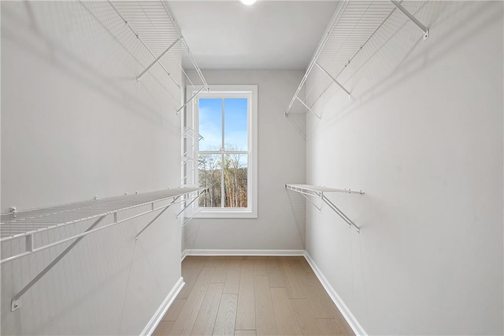 506 Whatton Road, Unit 3 Johns Creek, GA 30022 - Photo 20 of 36 a view of an empty room with a window