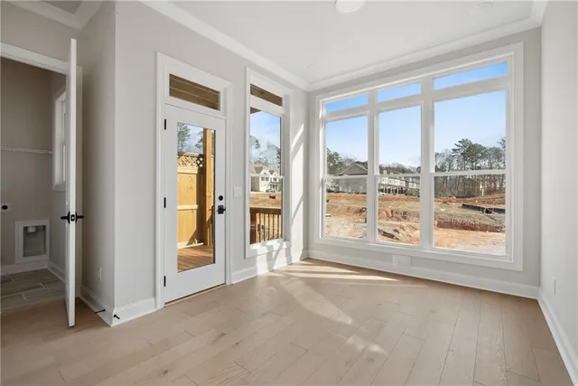 wooden floor and windows in an empty room