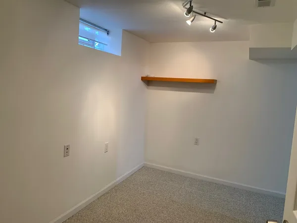 an empty room with a workbench