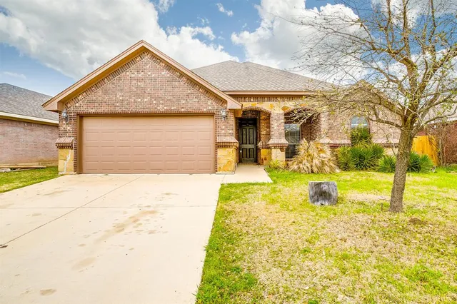 a front view of house with yard