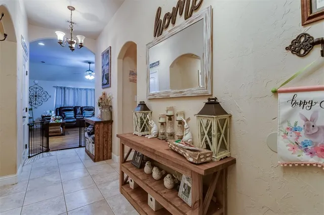 a kitchen with stove and cabinets