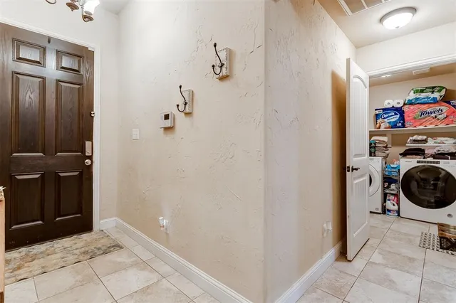 a view of a storage & utility room with a sink