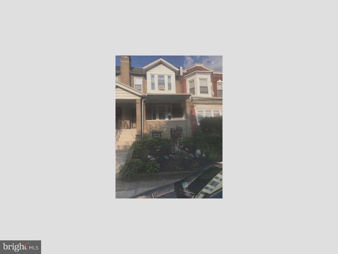 633 Marlyn Road Philadelphia, PA 19151 - Photo 1 of 13 a front view of a house with a glass door