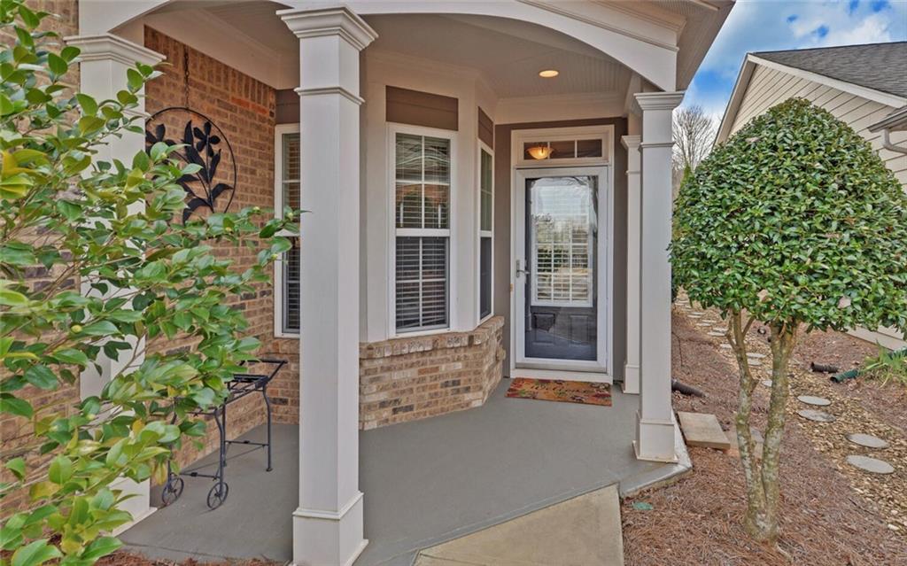 6213 Azalea Way Hoschton, GA 30548 - Photo 2 of 56 front view of a house with a yard