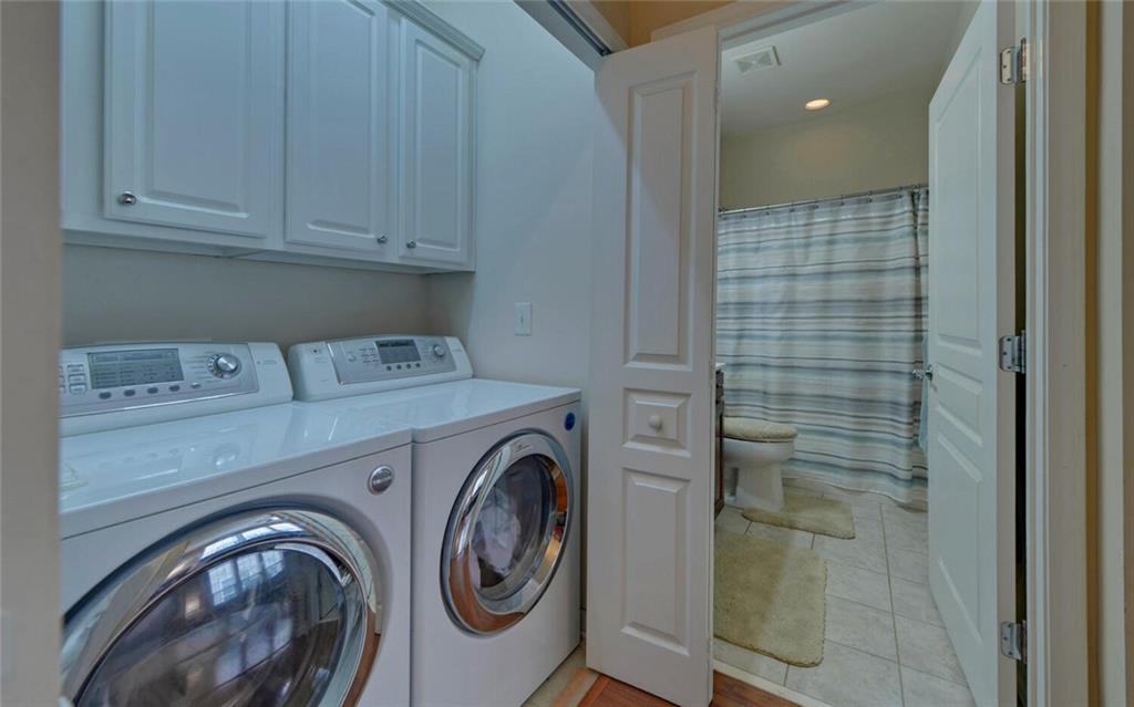 6213 Azalea Way Hoschton, GA 30548 - Photo 27 of 56 a utility room with dryer and washer