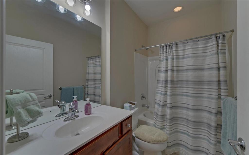 6213 Azalea Way Hoschton, GA 30548 - Photo 33 of 56 a bathroom with a sink toilet and shower
