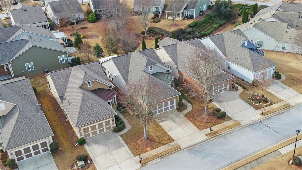 6213 Azalea Way Hoschton, GA 30548 - Photo 46 of 56 an aerial view of a house with a yard