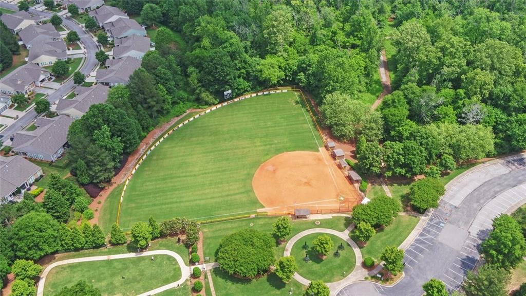 6213 Azalea Way Hoschton, GA 30548 - Photo 53 of 56 an aerial view of a house with swimming pool and outdoor space