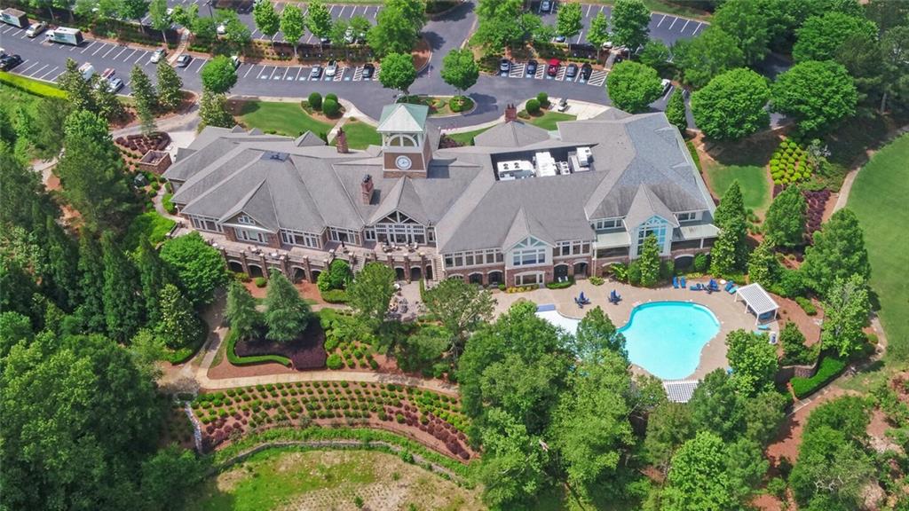 6213 Azalea Way Hoschton, GA 30548 - Photo 56 of 56 a aerial view of a house with a garden and a trees