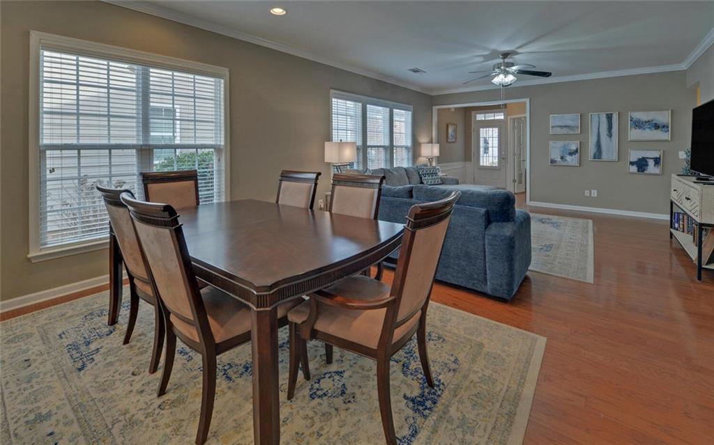 6213 Azalea Way Hoschton, GA 30548 - Photo 8 of 56 a view of a dining room with furniture