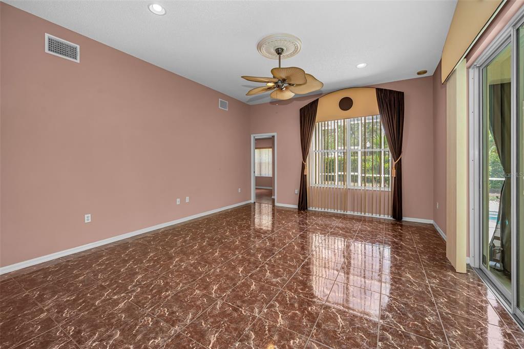 11917 Hadleigh Way Trinity, FL 34655 - Photo 23 of 84 a view of an empty room and window