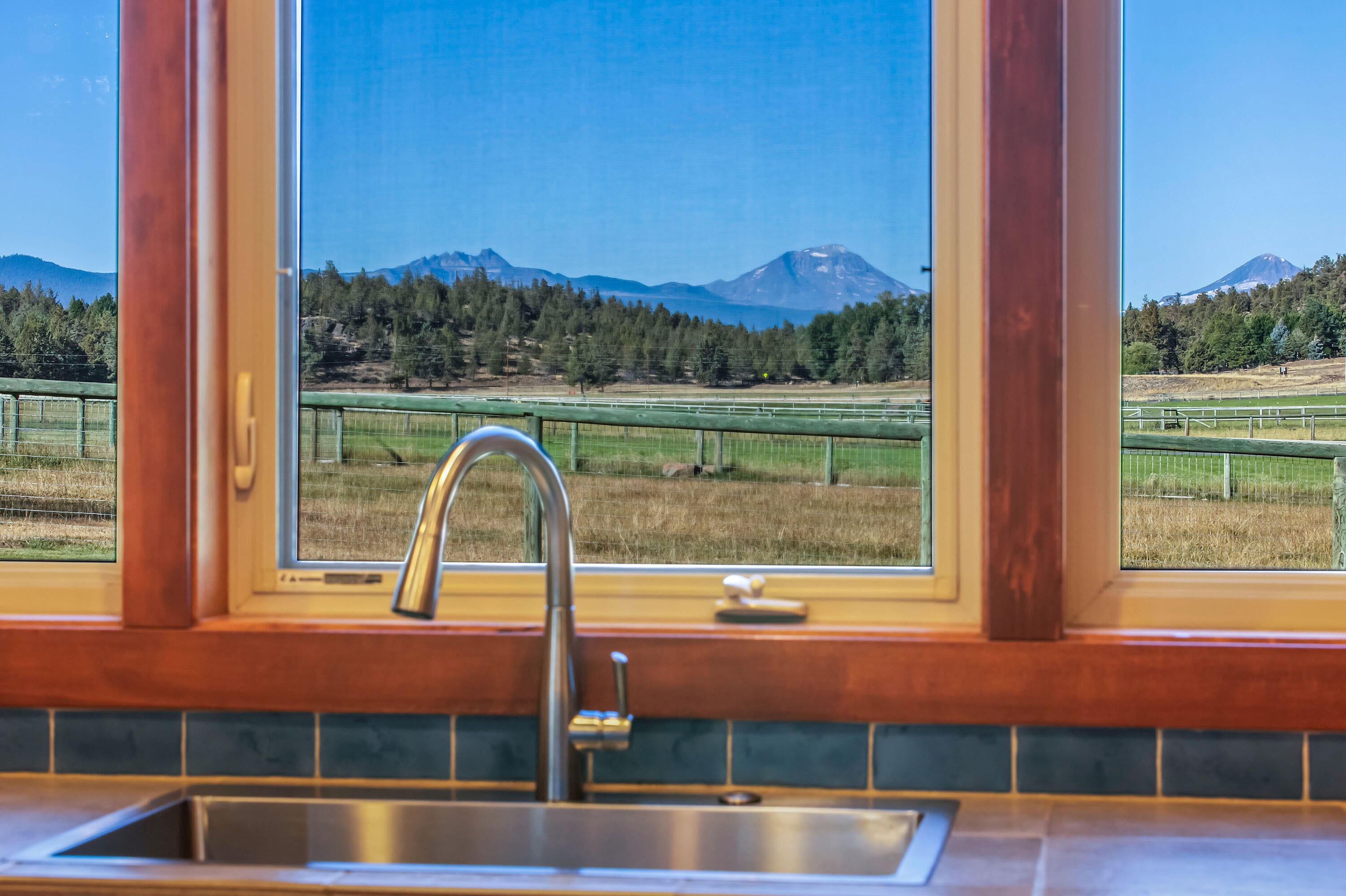 19460 Dayton Road Bend, OR 97703 - Photo 8 of 34 Beautiful Cascade Mountain views from every room.