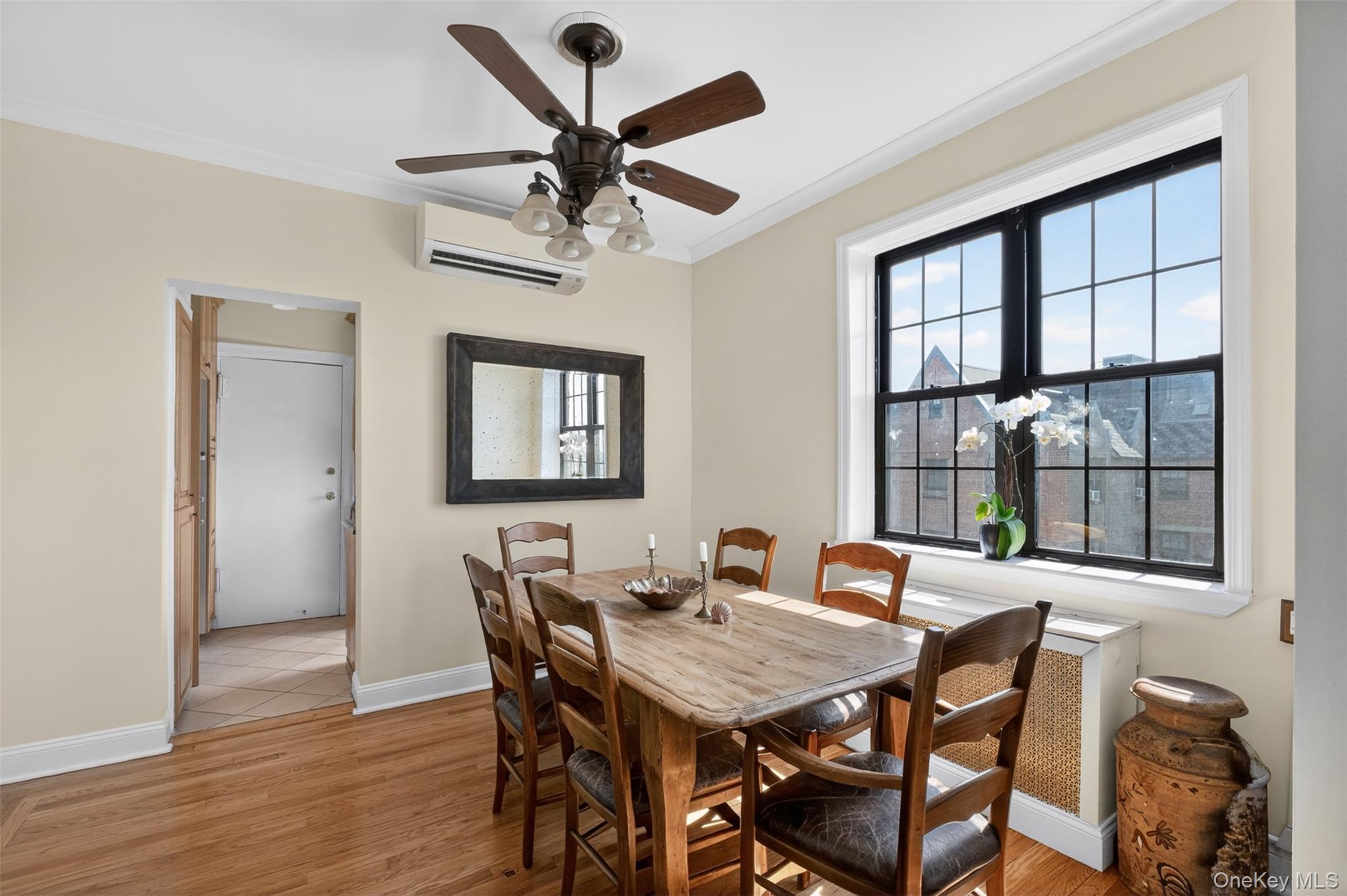 824 Bronx River Road, Unit 7C Bronxville, NY 10708 - Photo 6 of 13 a view of a dining room with furniture window and wooden floor