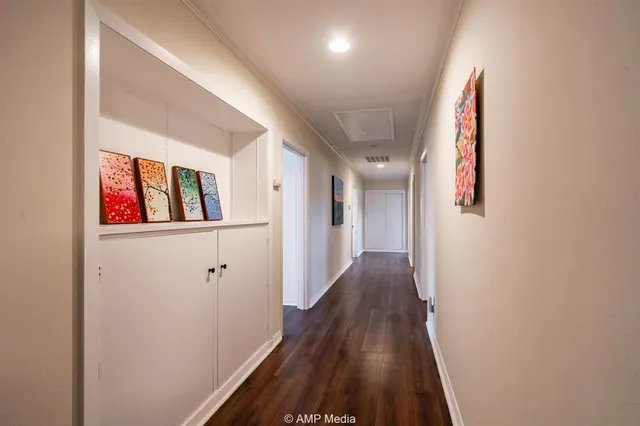 a front view of a house with outdoor seating