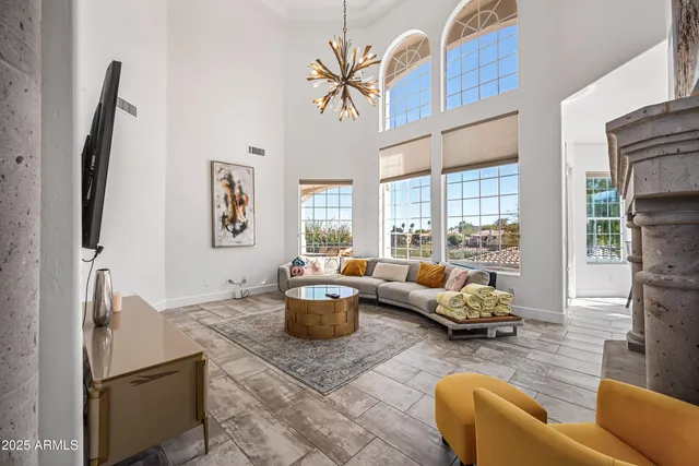 a large kitchen with stainless steel appliances granite countertop a stove and a sink