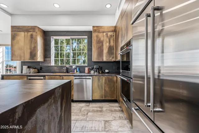 a kitchen with a stove and a microwave