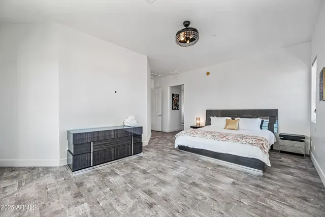 a front view of a house with lake view and a sitting space