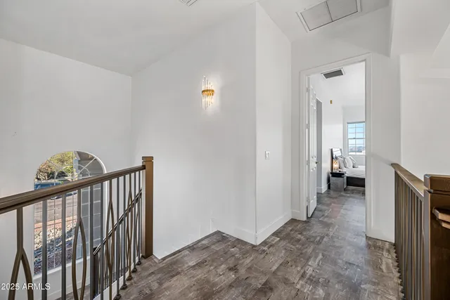 a view of a balcony with furniture