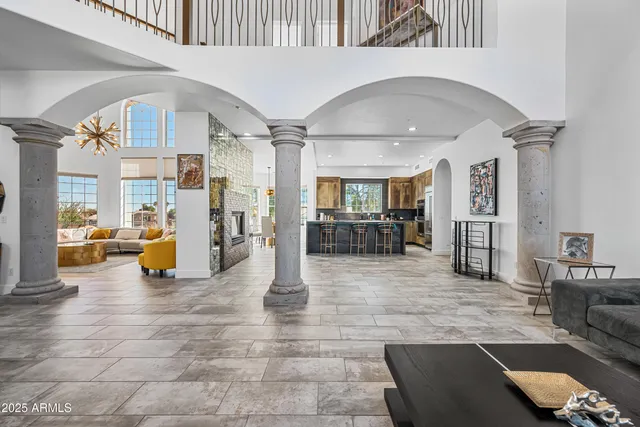 a view of a living room and entry way