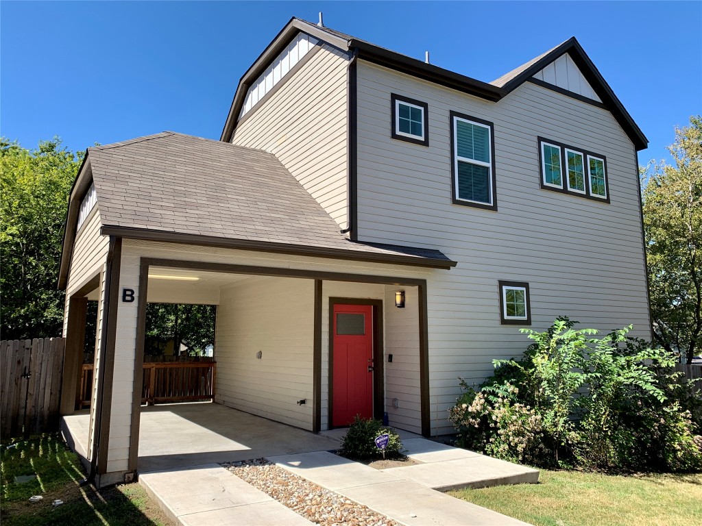 5205 Samuel Huston Avenue, Unit B Austin, TX 78721 - Photo 2 of 37 a front view of a house with garden