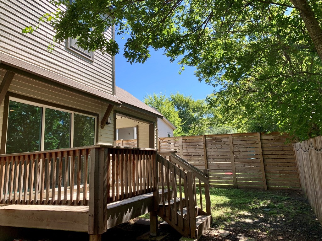 5205 Samuel Huston Avenue, Unit B Austin, TX 78721 - Photo 36 of 37 a view of a house with a yard and a patio