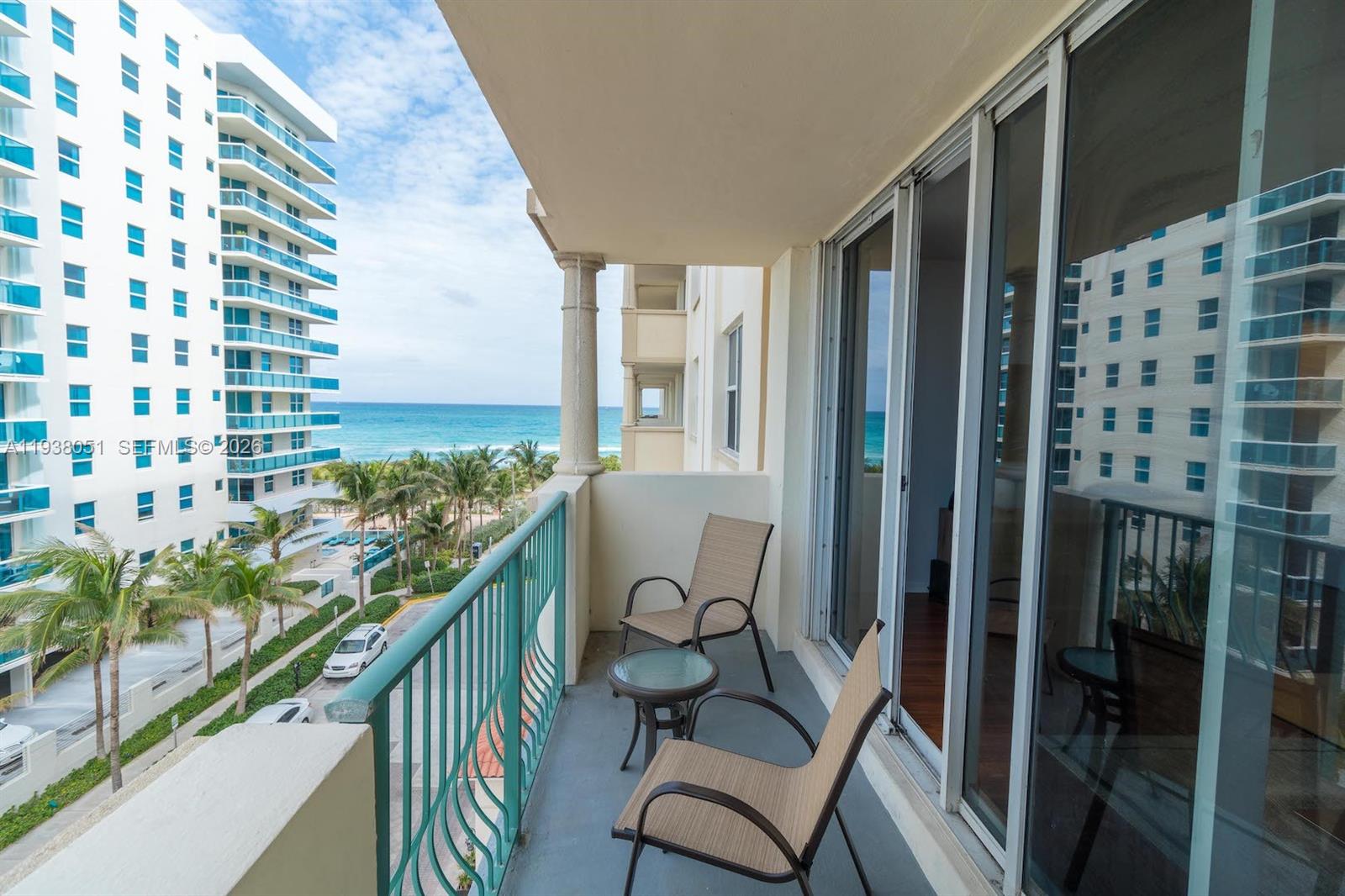 9195 Collins Avenue, Unit 611 Surfside, FL 33154 - Photo 17 of 33 a view of balcony with furniture