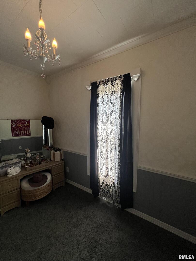 103 East Florence Street Sesser, IL 62884 - Photo 16 of 26 a view of a livingroom with furniture and chandelier