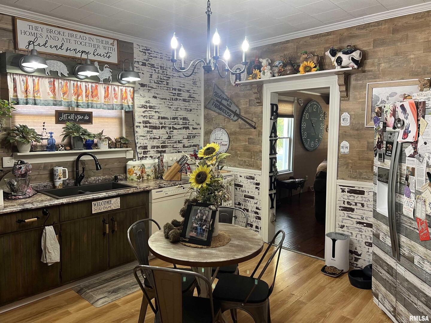 103 East Florence Street Sesser, IL 62884 - Photo 10 of 26 a dining room filled with furniture and chandelier