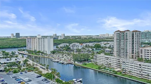 a view of a city and lake