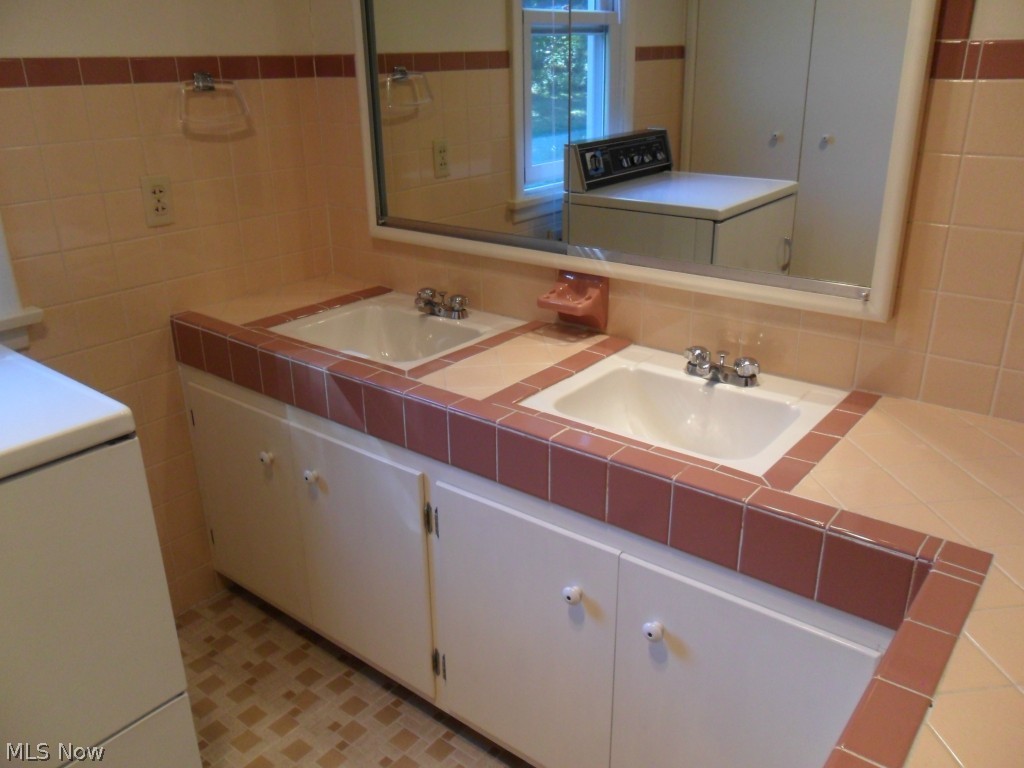 11703 Prospect Road Strongsville, OH 44149 - Photo 25 of 25 Second bathroom with double sinks.
