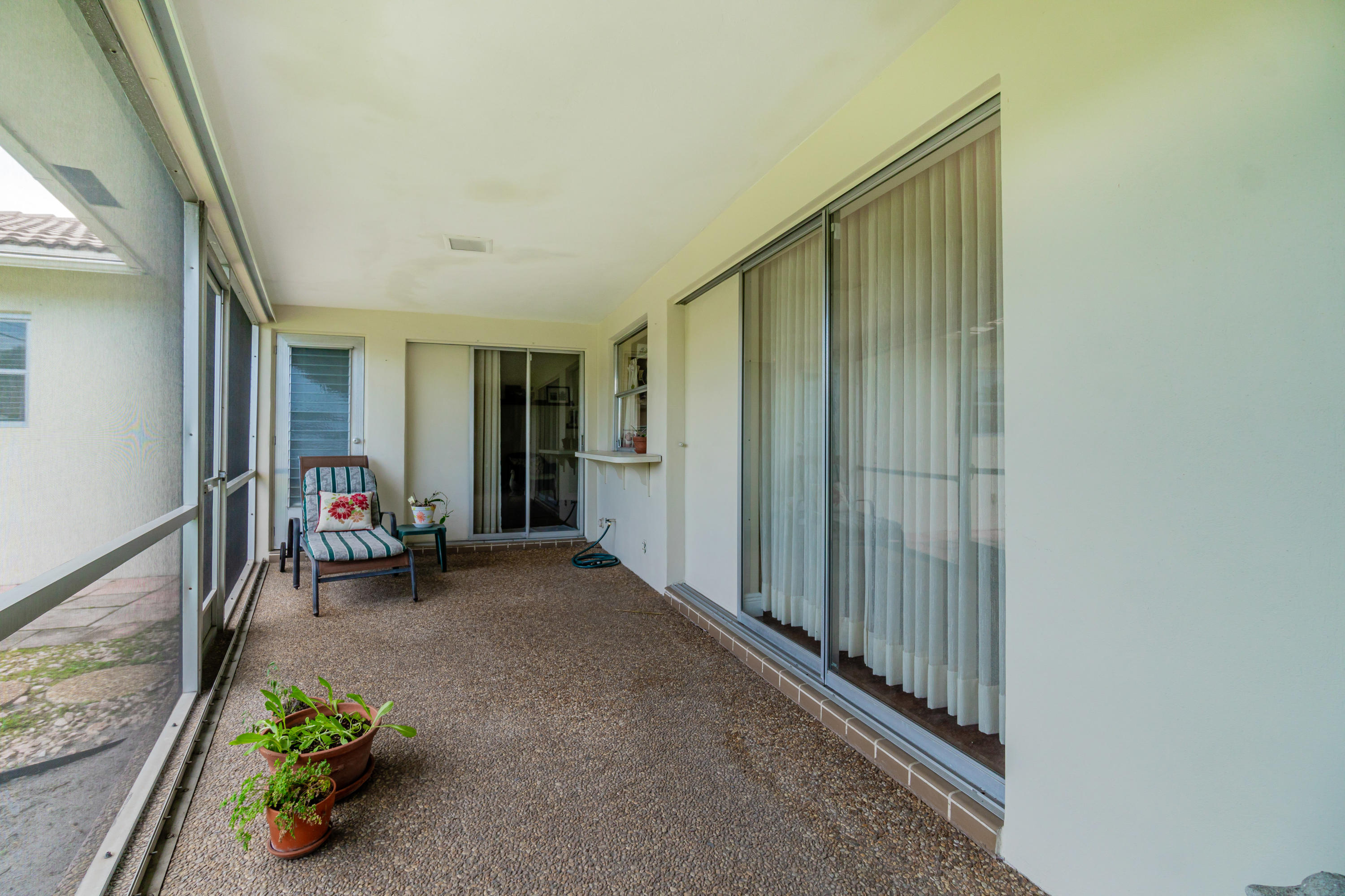 8 Tam O Shanter Lane Boca Raton, FL 33431 - Photo 33 of 41 Screened patio