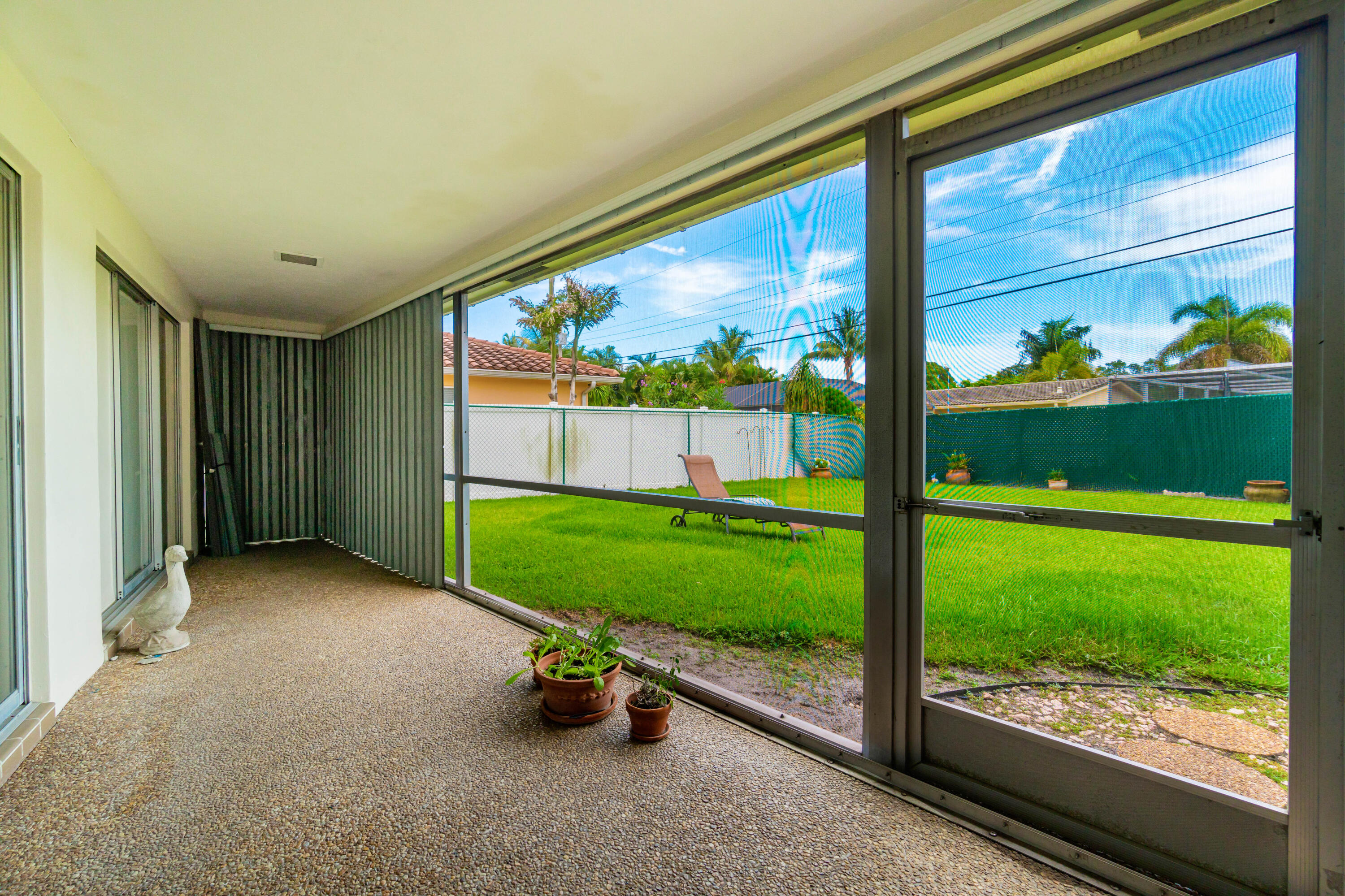 8 Tam O Shanter Lane Boca Raton, FL 33431 - Photo 34 of 41 Screened patio