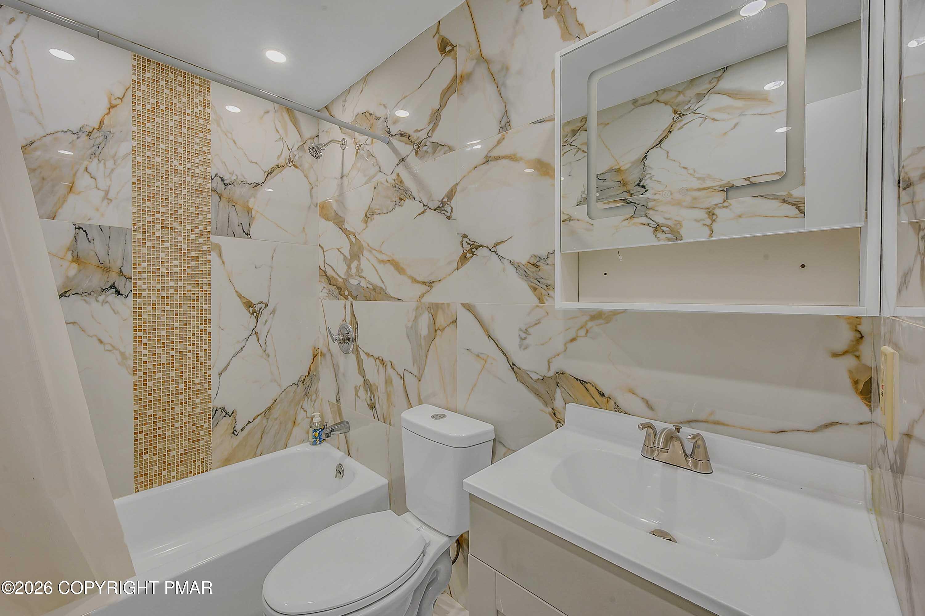 1027 Valley Road Newfoundland, PA 18445 - Photo 14 of 31 a bathroom with a sink toilet and shower