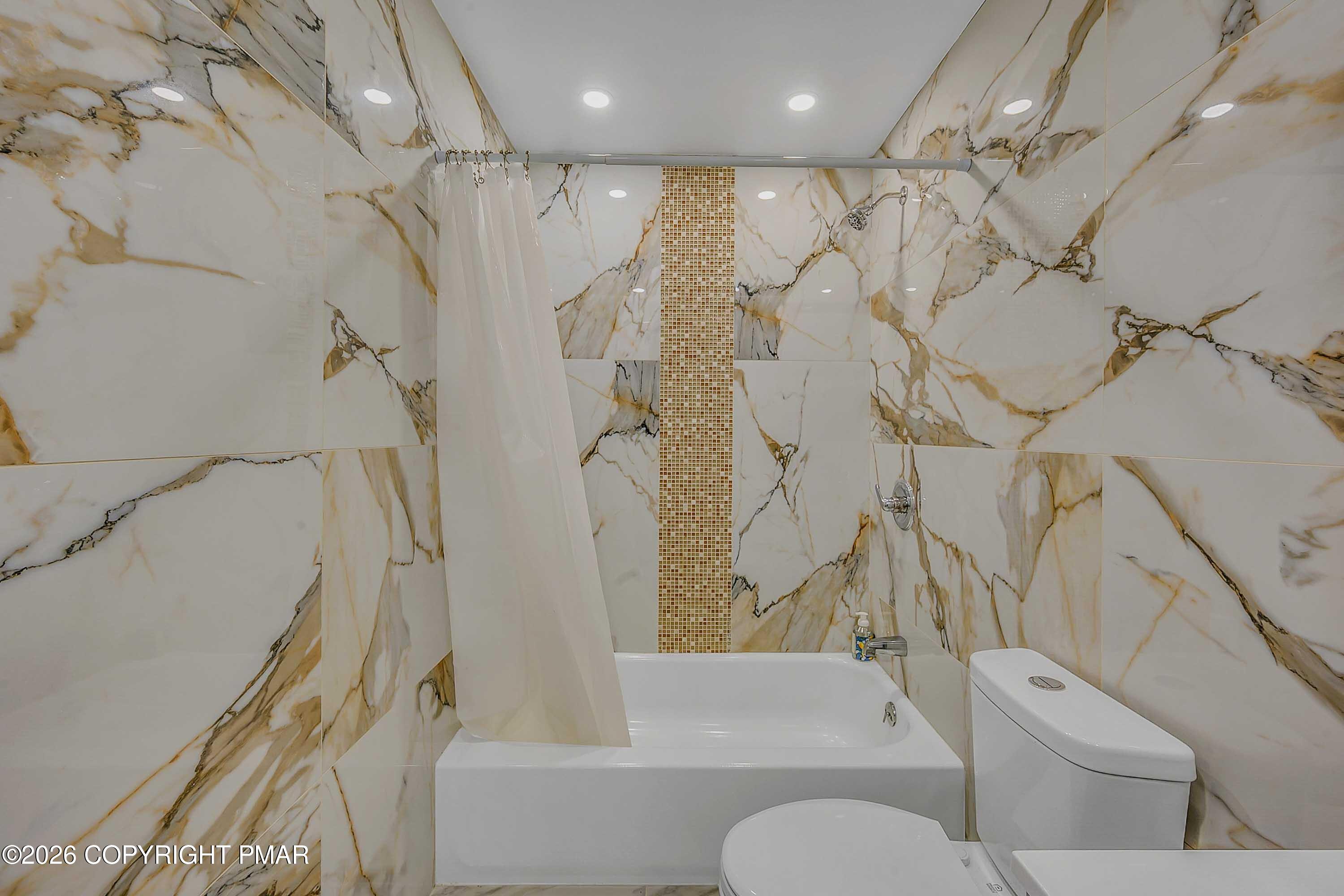 1027 Valley Road Newfoundland, PA 18445 - Photo 16 of 31 a bathroom with a toilet and a bathtub