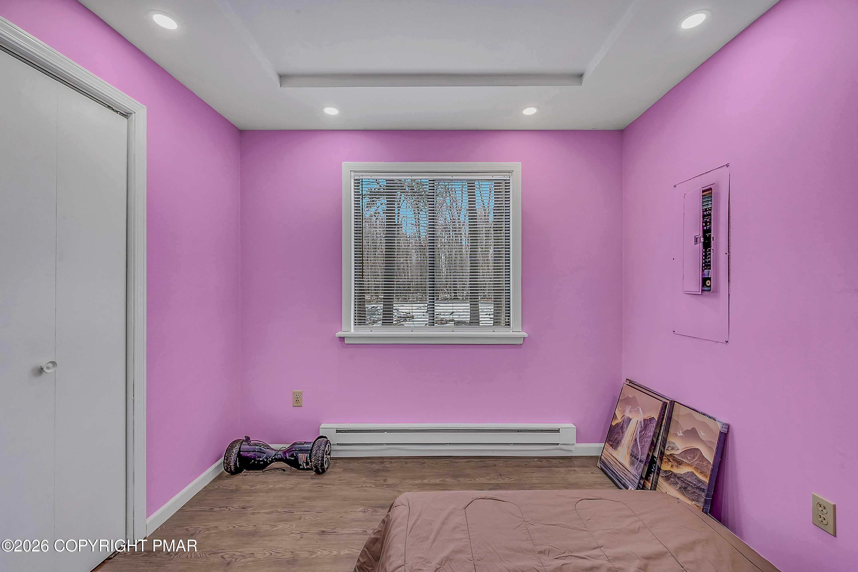 1027 Valley Road Newfoundland, PA 18445 - Photo 17 of 31 a pink room with pink walls