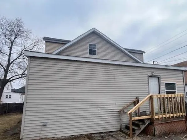 a view of backyard of house