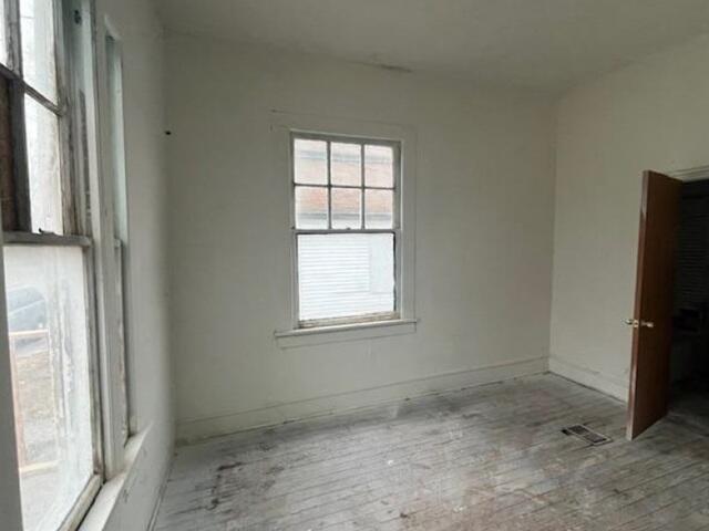 62 South Wayne Street Peru, IN 46970 - Photo 8 of 11 a view of a room that has a window in it