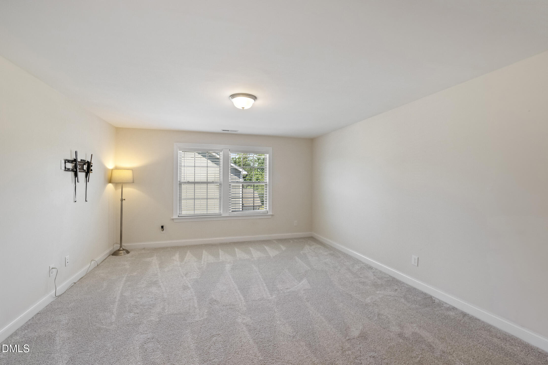 3541 Fairstone Road Wake Forest, NC 27587 - Photo 16 of 39 an empty room with a empty space and windows
