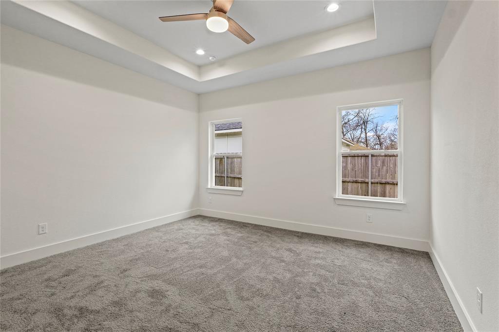 3335 Spring Avenue Dallas, TX 75215 - Photo 13 of 22 an empty room with windows