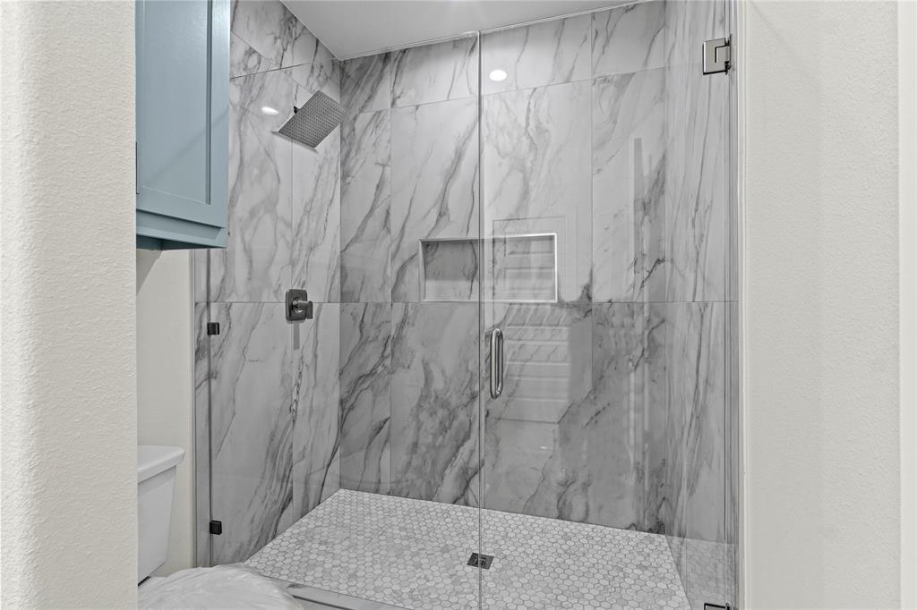 3335 Spring Avenue Dallas, TX 75215 - Photo 15 of 22 a bathroom with a shower