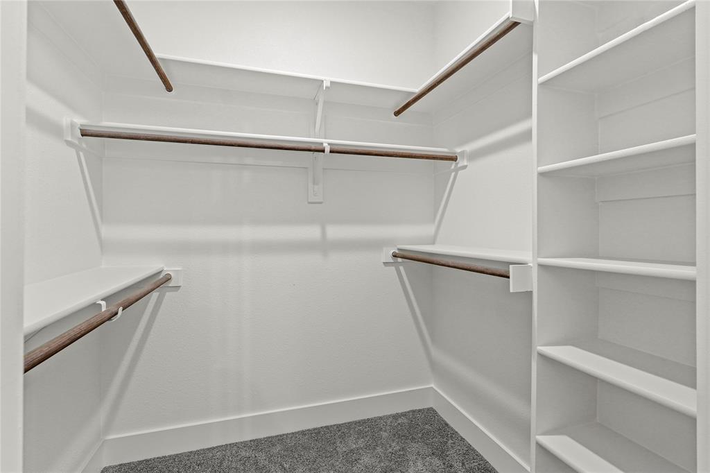 3335 Spring Avenue Dallas, TX 75215 - Photo 16 of 22 a view of an empty walk in closet