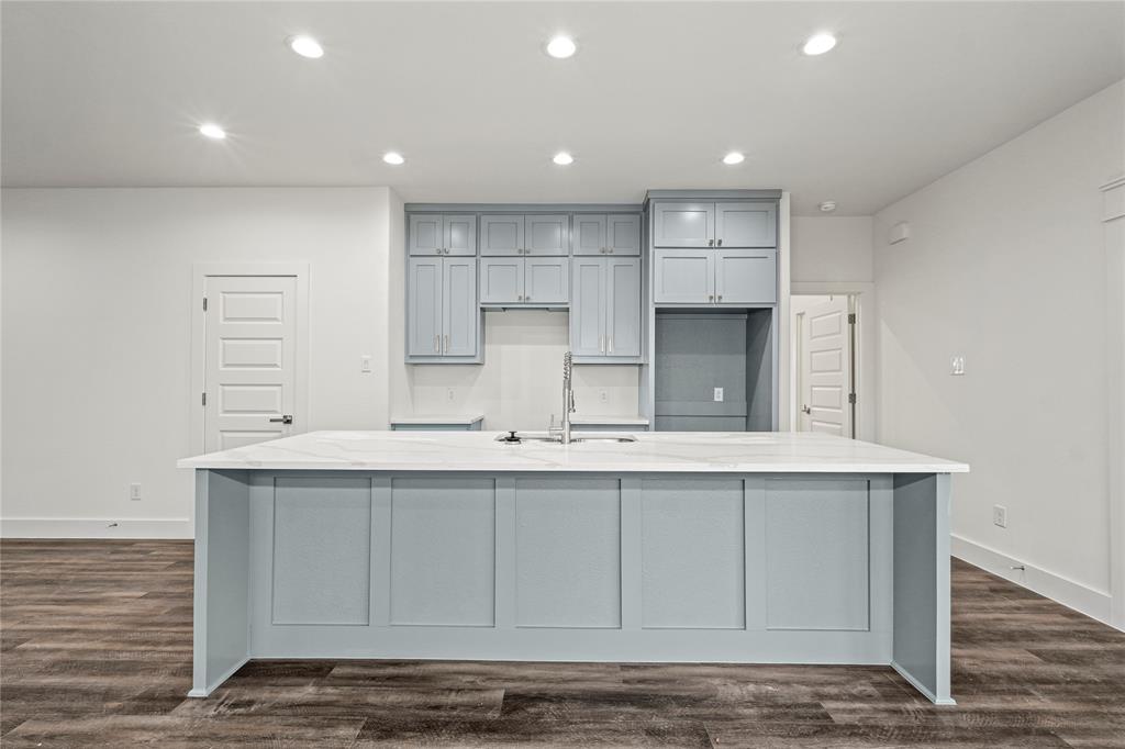 3335 Spring Avenue Dallas, TX 75215 - Photo 9 of 22 a view of kitchen with wooden floor