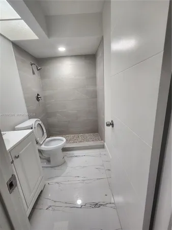 a bathroom with a sink and toilet