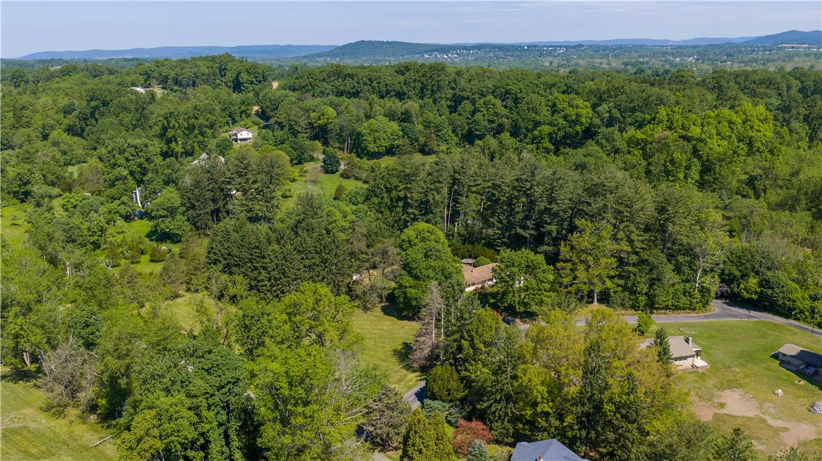 Coldsprings Rd Union Pottstown, PA 19465 - Photo 5 of 71 An aerial panorama reveals a vast, wooded estate with distant mountain vistas.
