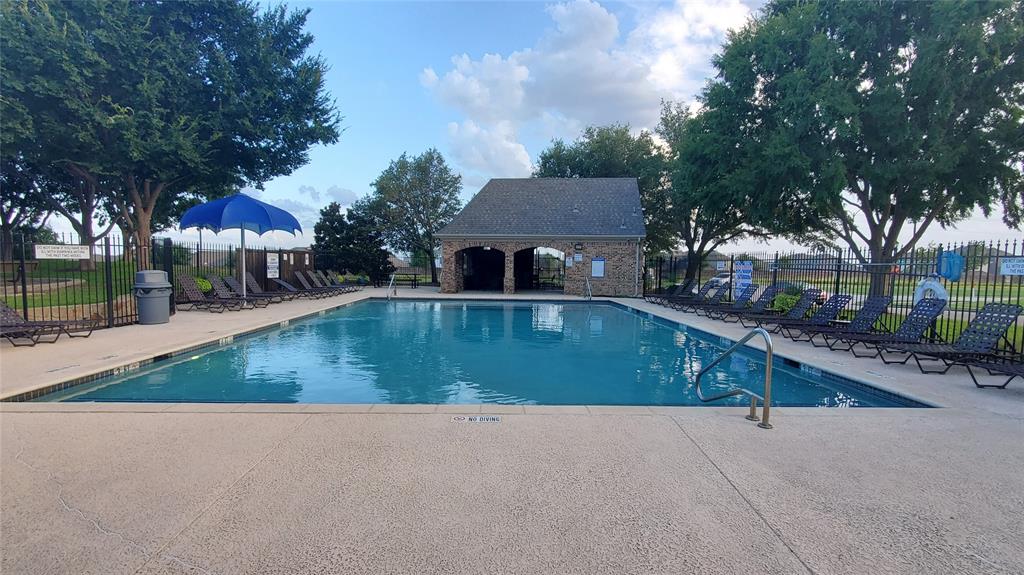 3416 Ridge Lily Lane McKinney, TX 75071 - Photo 24 of 32 Community pool featuring a patio