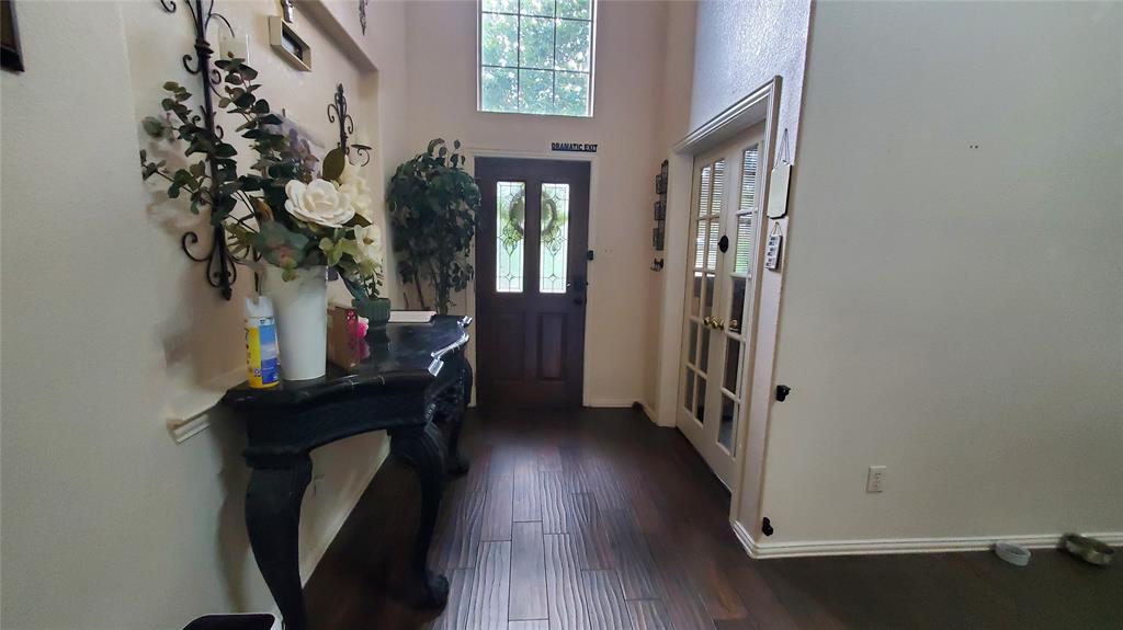 3416 Ridge Lily Lane McKinney, TX 75071 - Photo 3 of 32 Entryway with dark wood-style flooring and french doors