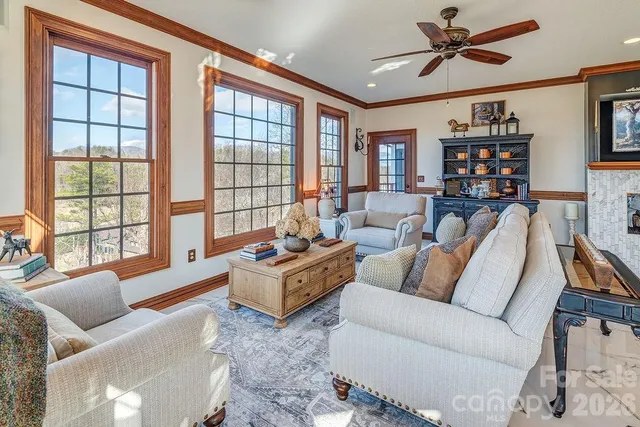 a living room with furniture or couch and a window