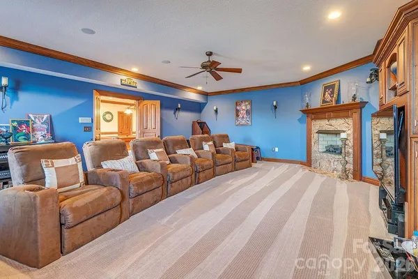 a bedroom with furniture and a chandelier