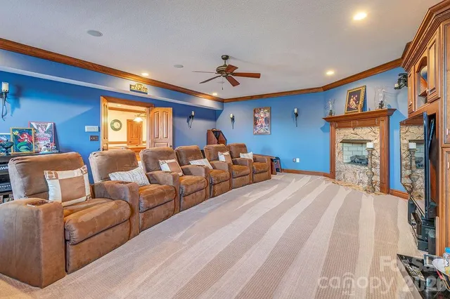 a bedroom with furniture and a chandelier