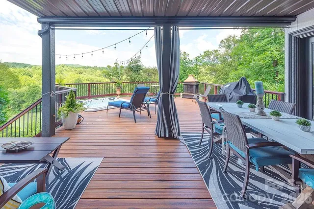 a view of a patio with wooden floor
